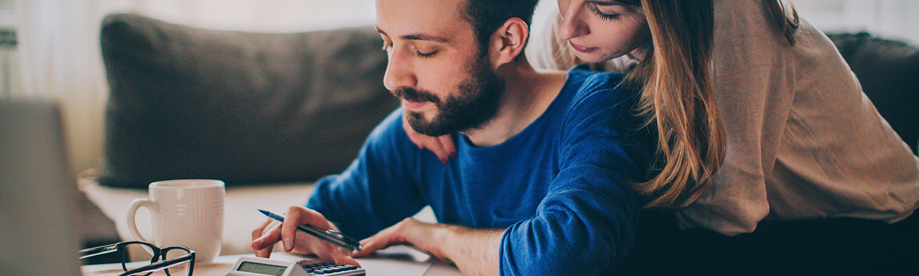 couple calculating finances